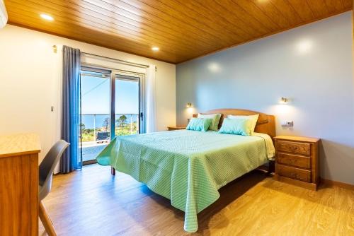 Ένα ή περισσότερα κρεβάτια σε δωμάτιο στο Quinta do Til