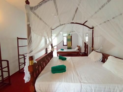 Ένα ή περισσότερα κρεβάτια σε δωμάτιο στο Chenaya Guest House