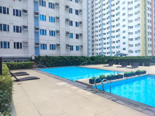 Πισίνα στο ή κοντά στο Tum's MPlace Staycation 28th Floor Tower C