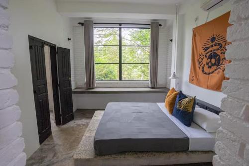 Ένα ή περισσότερα κρεβάτια σε δωμάτιο στο REZ SPACE Apartment 04