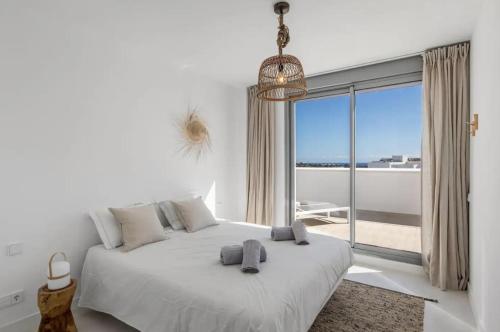 Ένα ή περισσότερα κρεβάτια σε δωμάτιο στο Luxury Penthouse with stunning views - Close to Marbella