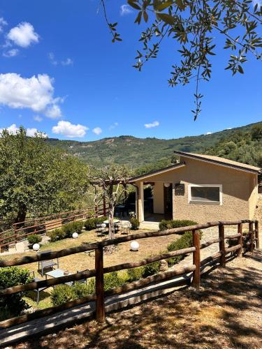 a house with a fence in front of it at Agriturismo Nonno Ninuccio in Gioi
