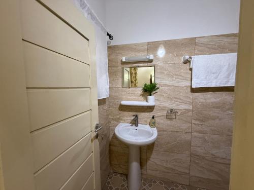 Koupelna v ubytování RÉSIDENCE LUXORIA Cotonou