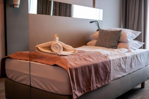 Postel nebo postele na pokoji v ubytování Hotel Kalnik
