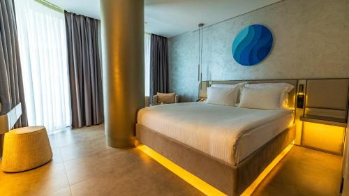 Postel nebo postele na pokoji v ubytování Four Hills Hotel