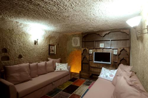 Χώρος καθιστικού στο Kayhan Cave Villa