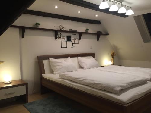 Ένα ή περισσότερα κρεβάτια σε δωμάτιο στο Ferienhaus Kammerer