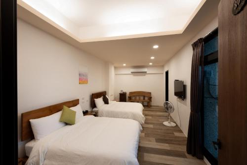 Cama o camas de una habitación en Bondi Homestay