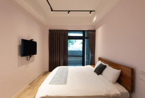 Postel nebo postele na pokoji v ubytování Bondi Homestay