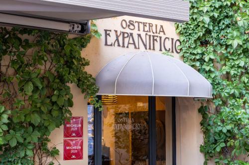 a store with an umbrella in front of a store at Locanda Expanificio in Agrigento