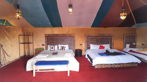 Postel nebo postele na pokoji v ubytování luxury safari camp