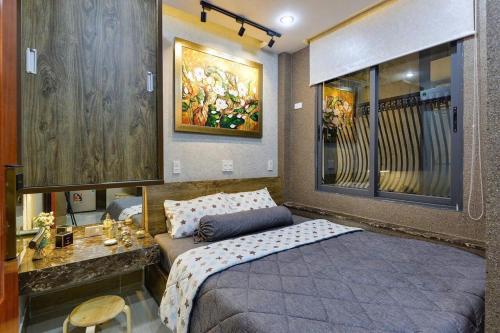 Katil atau katil-katil dalam bilik di Peanuts Home - Central HCM, 5 mins to Bui Vien l Full Amenities