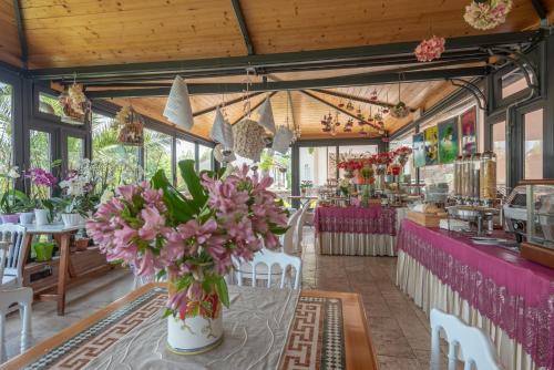 Boutique Hotel al Grappolo d'Oroにあるレストランまたは飲食店