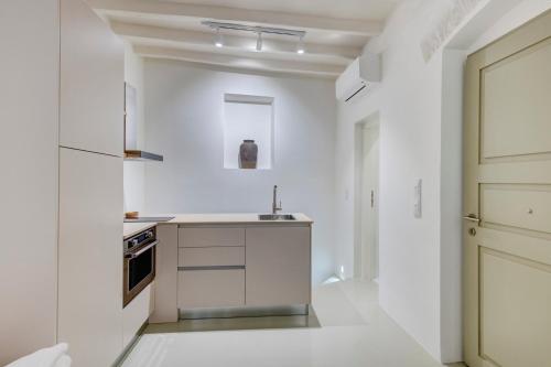 Kuchyň nebo kuchyňský kout v ubytování Aplotis home
