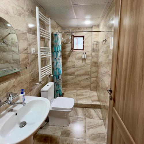 Koupelna v ubytování Labarum Guesthouse
