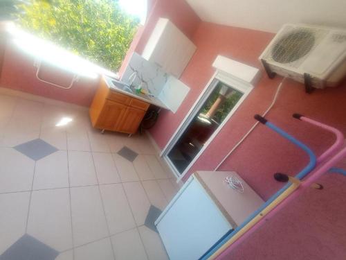 an overhead view of a bathroom with a sink and a shower at Asko Villa Apartment in Ulcinj