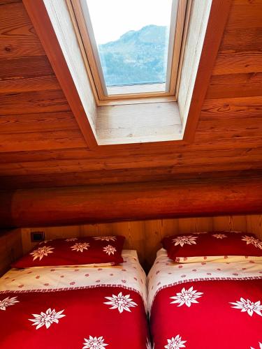 Katil atau katil-katil dalam bilik di Flora Alpina apartments-Residenza Verdebjo