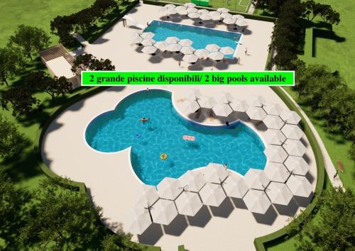 a rendering of a swimming pool with a graphic of a lake at Pizzo Beach Club in Pizzo