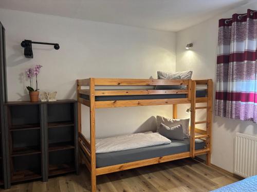 Postel nebo postele na pokoji v ubytování Ferienwohnung Eberharter