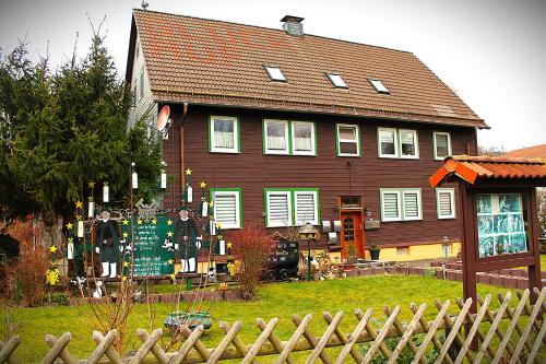 a large house with a fence in front of it at Ferienwohnung Steiger-Kaue am Rammelsberg in Goslar