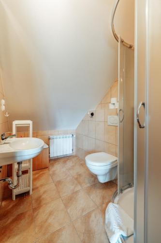 Koupelna v ubytování Apartament pod Glinikiem