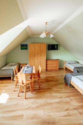 Postel nebo postele na pokoji v ubytování Apartament pod Glinikiem