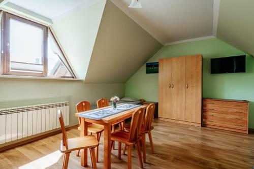 TV a/nebo společenská místnost v ubytování Apartament pod Glinikiem
