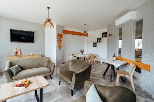 TV a/nebo společenská místnost v ubytování Apartament pod Glinikiem
