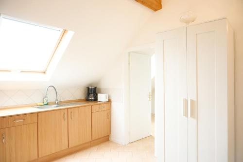 Η κουζίνα ή μικρή κουζίνα στο Apartment Wiesbaden in Toplage am Kurpark, ruhig und zentral