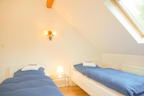 Ένα ή περισσότερα κρεβάτια σε δωμάτιο στο Apartment Wiesbaden in Toplage am Kurpark, ruhig und zentral