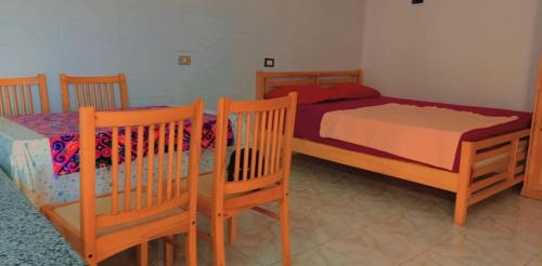 Postel nebo postele na pokoji v ubytování Seaview Honeymoon Escape- Studio