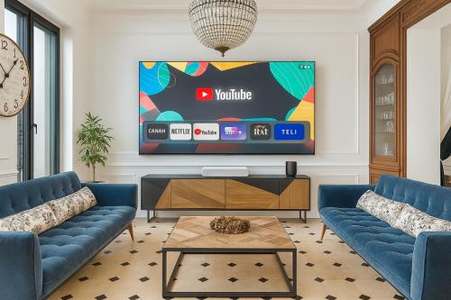 TV o dispositivi per l'intrattenimento presso La Maison de Maître, Piscine & Spa