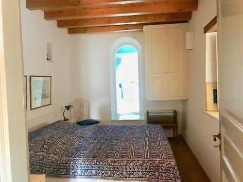 Postel nebo postele na pokoji v ubytování Inspiration Hydra