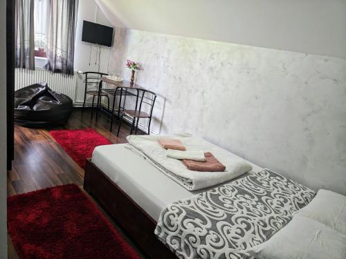 Postel nebo postele na pokoji v ubytování Casa 7 Izvoare