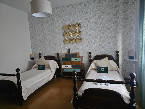 Postel nebo postele na pokoji v ubytování Le Palme B&B
