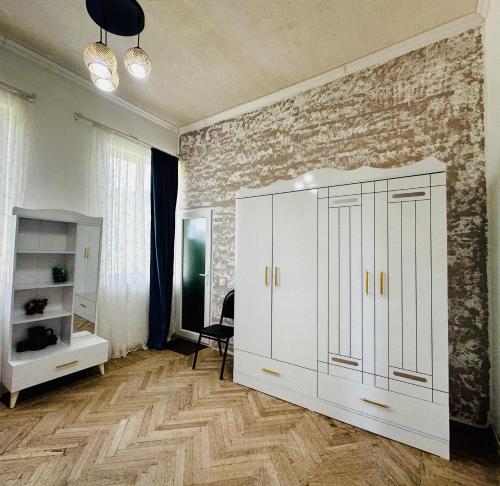 Postel nebo postele na pokoji v ubytování Old House Korolistavi