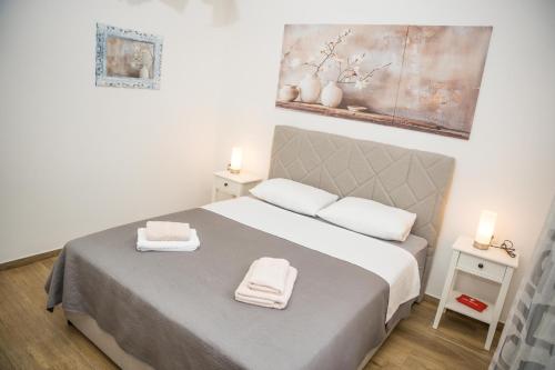 Postel nebo postele na pokoji v ubytování Gariful