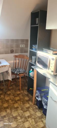 Η κουζίνα ή μικρή κουζίνα στο Dachgeschoss Wohnung nahe SAP