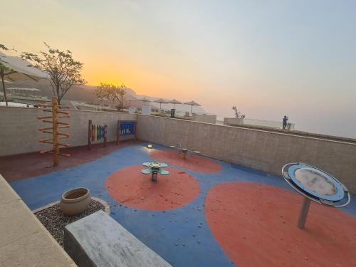 a view of a patio with a table in the middle at IL MONTE Galala -families only- المونت جلالة in Ain Sokhna