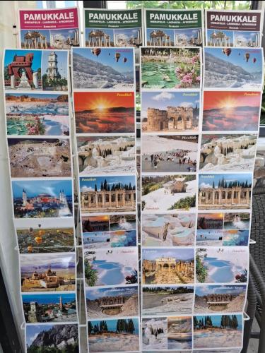 a collage of photos of landmarks on a wall at Paradise House in Pamukkale