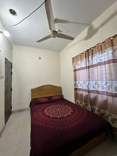 Hotel Rongdhanu Residentialにあるベッド