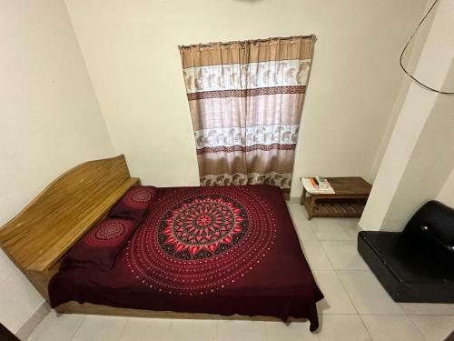 Hotel Rongdhanu Residentialにあるベッド