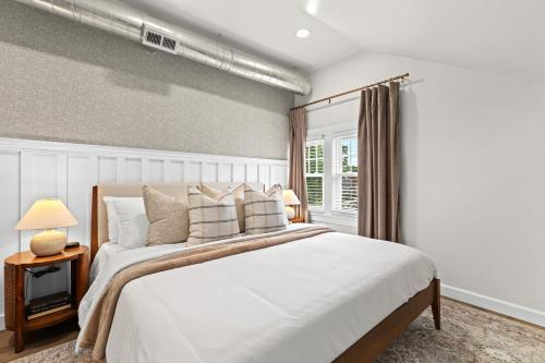 a bedroom with a large bed and a window at Ardmore in Ferndale