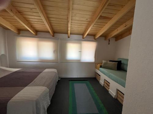 Ένα ή περισσότερα κρεβάτια σε δωμάτιο στο Cozy Akyaka