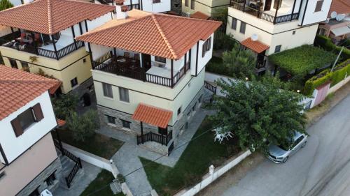 an overhead view of a house with a street at THETIS Luxury House in Nikiti