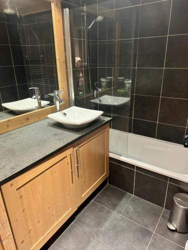 Koupelna v ubytování Hameaux du glaciers