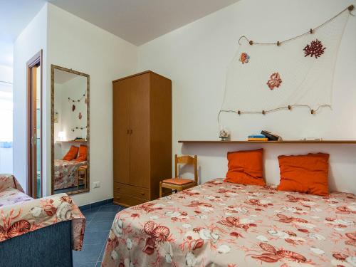 En eller flere senge i et værelse på Casa Vacanze Vespucci 4