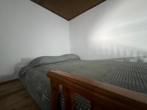 a bedroom with a bed in the corner of a room at Gennadi Sunrise in Gennadi