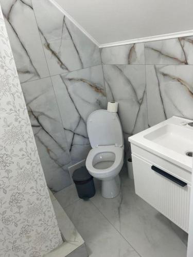 U Kvasu Hotelにあるバスルーム