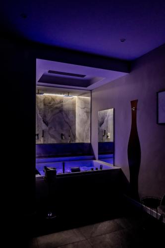 a dark room with a pool table and a vase at Marenda - B&B in Bari